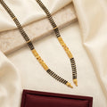 Gold Triple-Strand Black Bead Floral Finial Mangalsutra Set