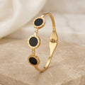 Gold Onyx Roman Numeral Disc Bracelet