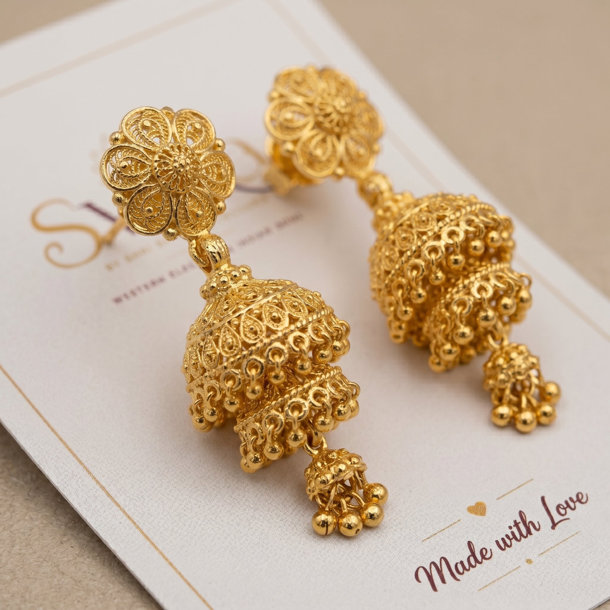 Gold Antique Double-Tier Jhumka Earrings