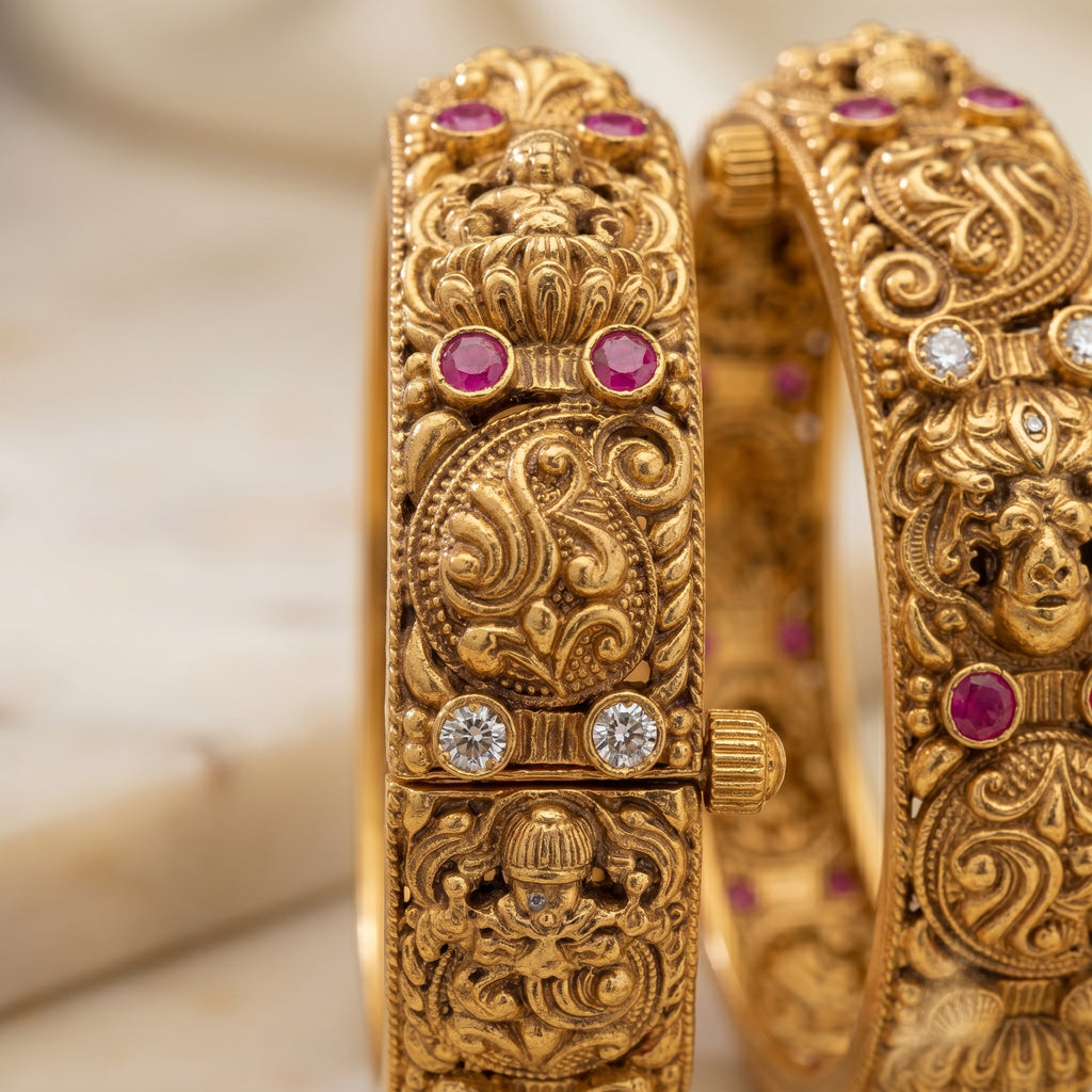 Gold Devi Mukha Nakshi Temple Relief Bangle Pair