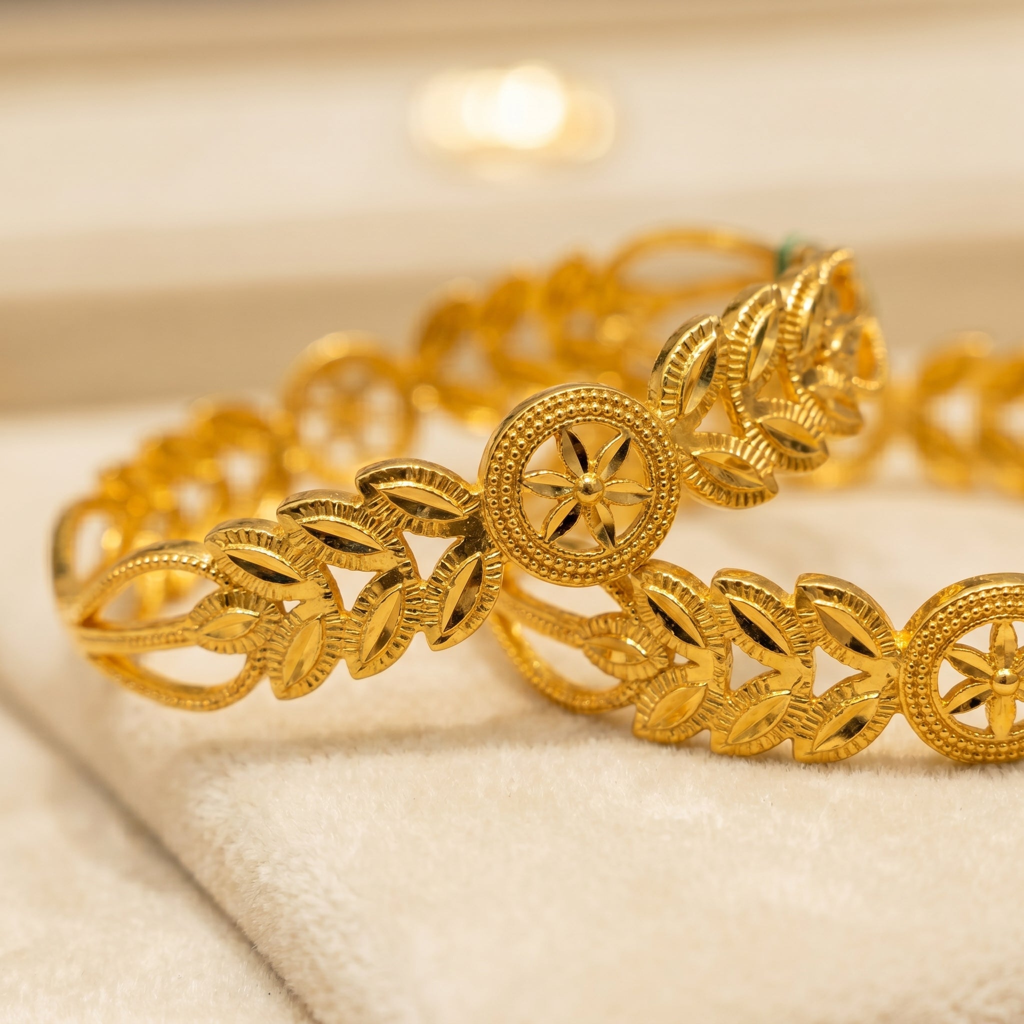Gold Chakra Wheel and Leaf Cluster Open-Work Bangle Pair