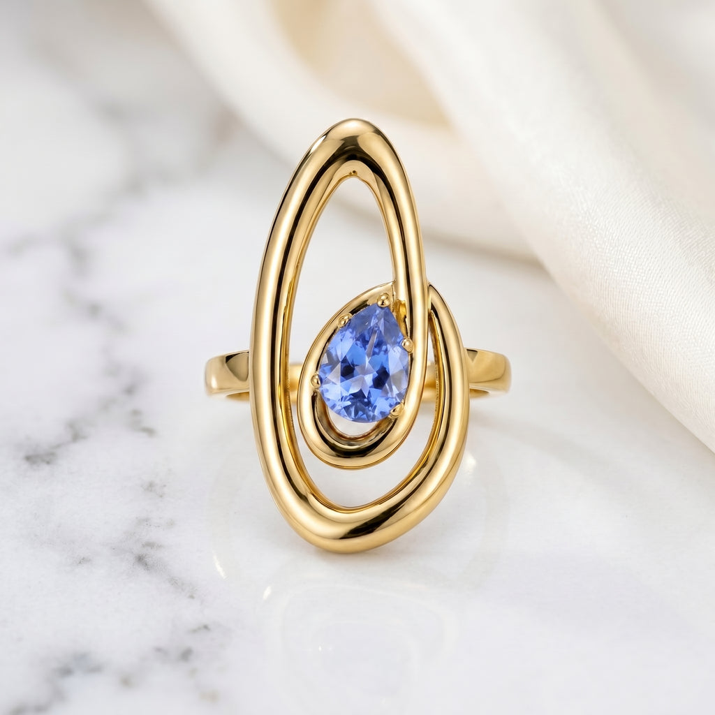 Double Orbit Statement Ring with Blue Pear Stone