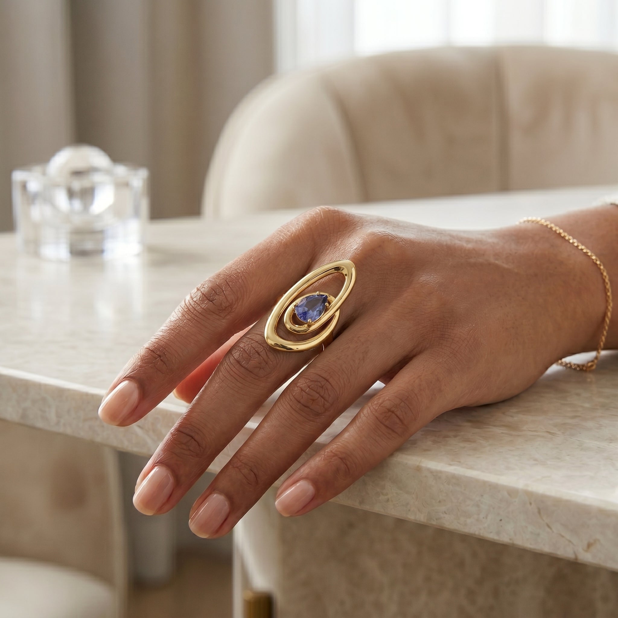 Double Orbit Statement Ring with Blue Pear Stone